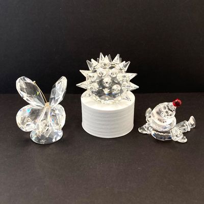 LOT 108: Collection of Swarovski Crystal Small Figurines - Butterfly, Porcupine and Clown