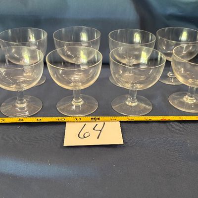 vintage clear glass champagne coupes and tall sherbet glasses