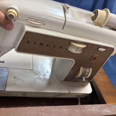 Singer Sewing Machine in Cabinet