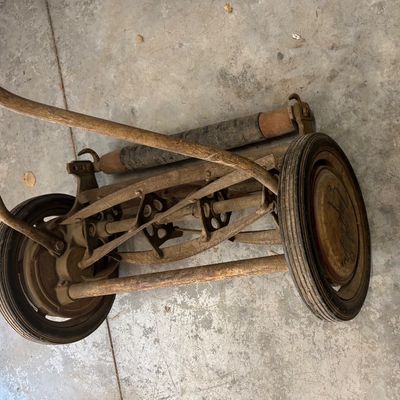 vintage cast-iron Zephyr manual push reel lawn mower