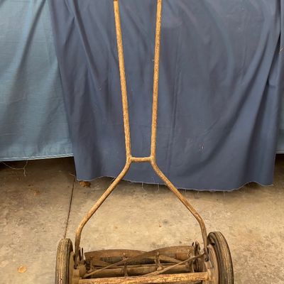 vintage cast-iron Zephyr manual push reel lawn mower