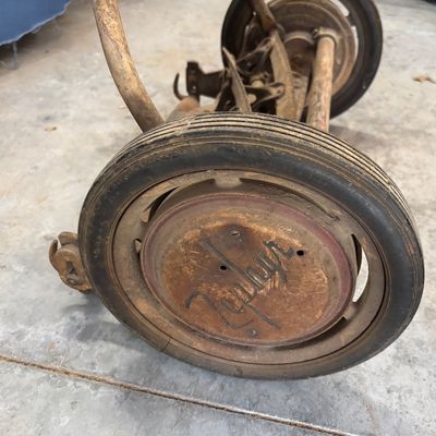 vintage cast-iron Zephyr manual push reel lawn mower
