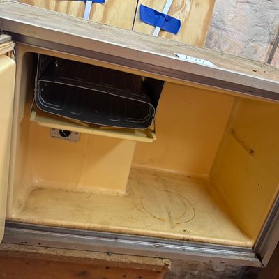 vintage mid-century modern style small wall-mounted icebox