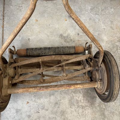 vintage cast-iron Zephyr manual push reel lawn mower