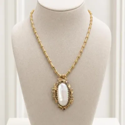 Sale Photo Thumbnail #107: Gold-Tone Necklace With Large Oval White Stone