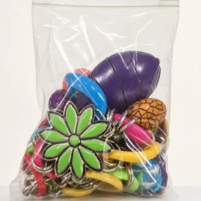 Sale Photo Thumbnail #56: Bag of Colorful Costume Jewelry