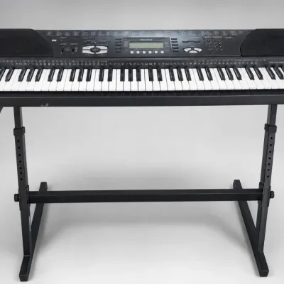 Sale Photo Thumbnail #291: Electronic Keyboard with Adjustable Stand