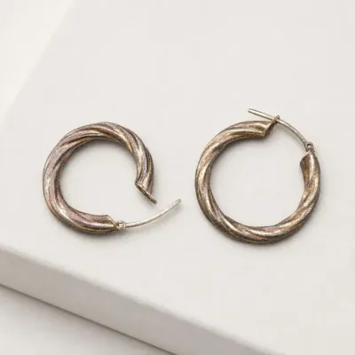 Sale Photo Thumbnail #34: Pair of Twisted Metal Hoop Earrings