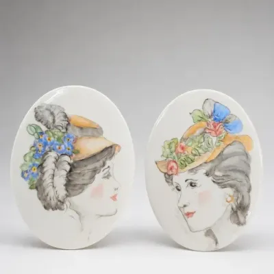 Sale Photo Thumbnail #304: Pair of Hand-Painted Ceramic Portrait Plaques