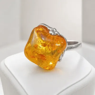 Sale Photo Thumbnail #20: Silver-Tone Ring with Large Amber-Colored Stone