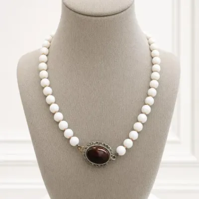 Sale Photo Thumbnail #87: White Bead Necklace With Large Dark Stone Pendant