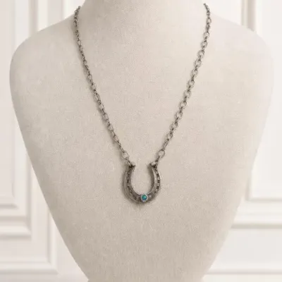 Sale Photo Thumbnail #103: Silver-Tone Horseshoe Necklace with Blue Stone
