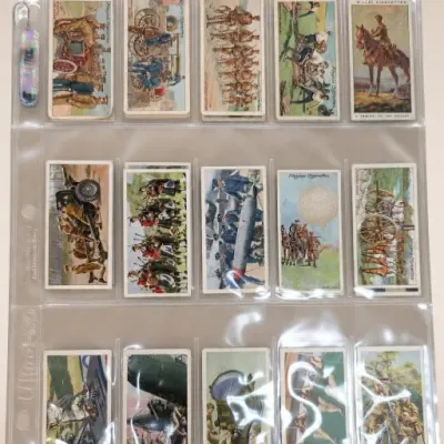 Sale Photo Thumbnail #49: Assorted Illustrated Military Trading Cards in Plastic Sleeve