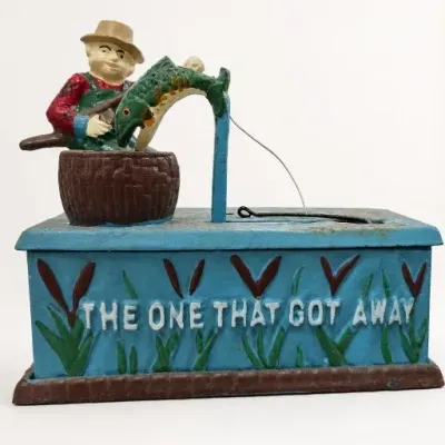 Sale Photo Thumbnail #171: Painted Cast Metal "The One That Got Away" Bank