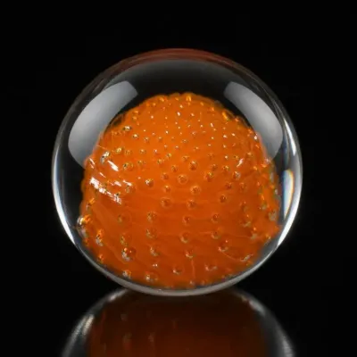 Sale Photo Thumbnail #159: Clear Glass Paperweight With Orange Center