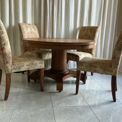 The Breece Dining Table And Chairs 