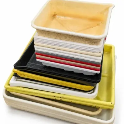 Stacked Plastic Utility Trays Assortment