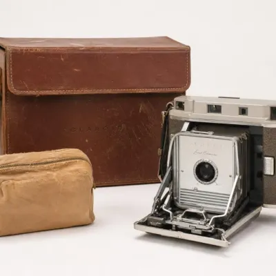 Folding Camera With Brown Leather Case and Pouch
