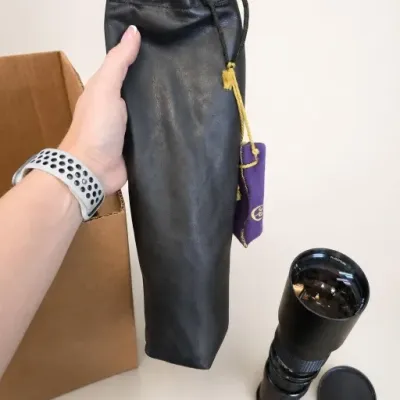 Camera Lens With Black Storage Pouch