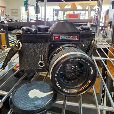 Black 35mm Film Camera With Chinon Lens