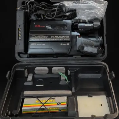 Black Video Camera With Case and Accessories