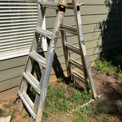 Two Outdoor Extendable Ladders