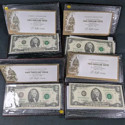 (4) Uncirculated $2 Bills In Collector Folders! High Grade Notes!
