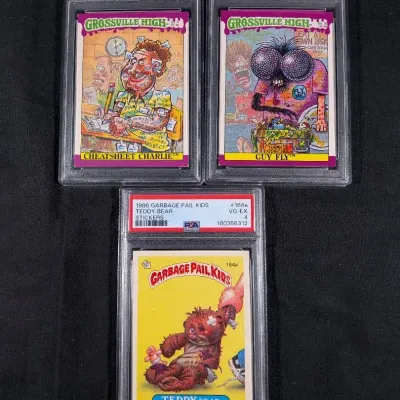 (2) 1996 Fleer Grossville High Cards, (1) Garbage Pail Kids Card - All PSA Graded