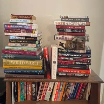 A Variety Of Hardcover And Soft Cover Books