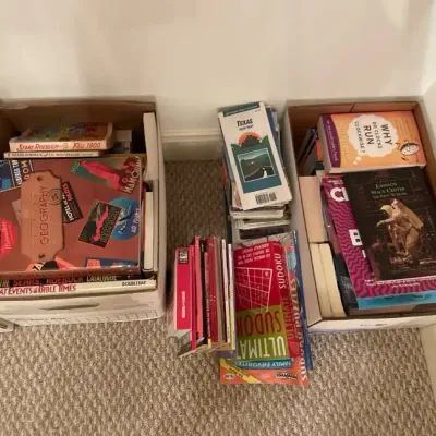 A Variety Of Hardcover And Soft Cover Books
