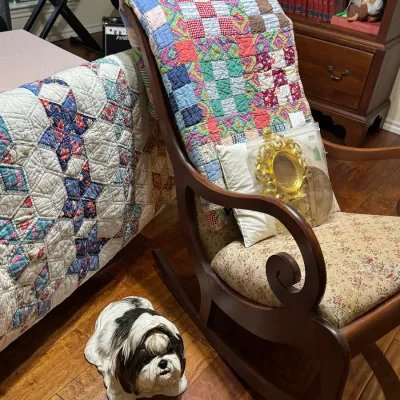antique rocker and quilts