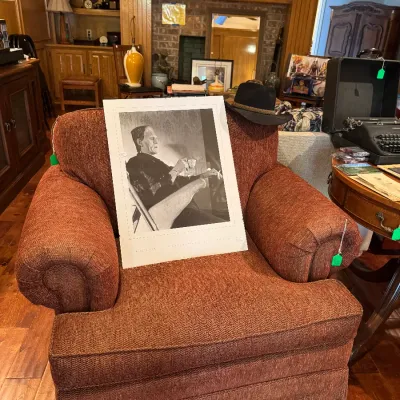 overstuffed chair and framed frakensteiin poster