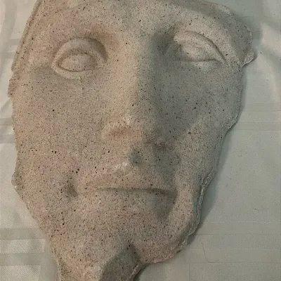 Stone Face Wall Sculpture