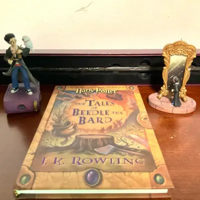 Harry Potter Book, Figures, And Sirius Wand 