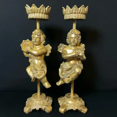 Pair Of Gilt Cherub Candle Holders