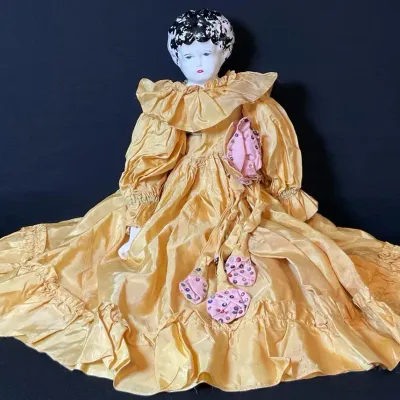 German China Head Porcelain Doll In Golden Yellow Dress