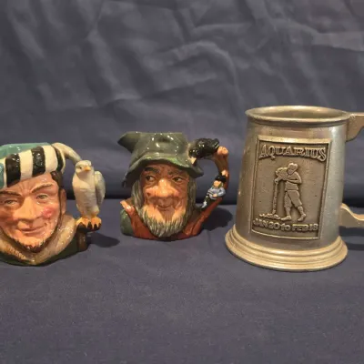Vintage Drinkware Lot: (2) Royal Doulton Small Character Toby Jugs & Wilton Armetale Aquarius Stein
