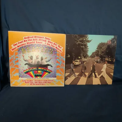 Two-album Beatles vinyl record lot featuring Abbey Road and Magical Mystery Tour, both issued on App