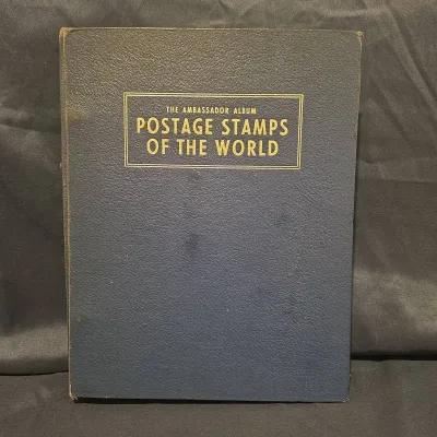 Vintage H.E. Harris "The New Ambassador" Worldwide Stamp Album - Heavily Filled