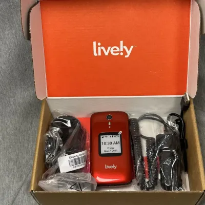 Lively Red Flip Phone with Charging Dock and Accessories
