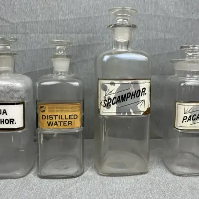 Glass Stoppered Apothecary Bottles with Assorted Labels