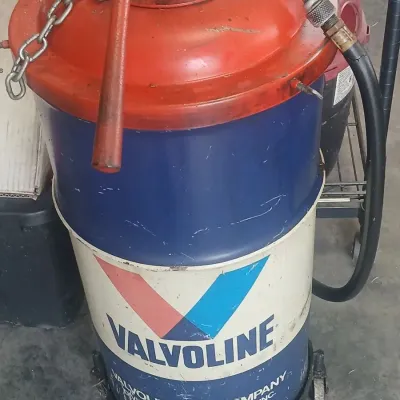 Sale Photo Thumbnail #130: Valvoline oil extracting can