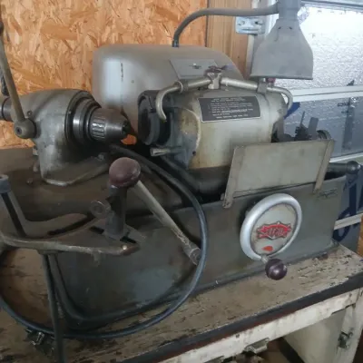 Sale Photo Thumbnail #28: Sioux 645L valve face grinding machine