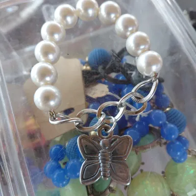 Sale Photo Thumbnail #202: Dangling Pearl Bead with Butterfly