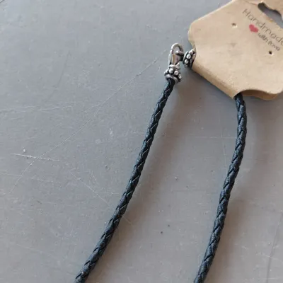 Sale Photo Thumbnail #220: Sterling Silver Cross with Abalone/Mother of Pearl on Black Braided chain.