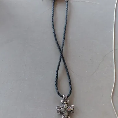 Sale Photo Thumbnail #215: Sterling Silver Cross with Abalone/Mother of Pearl on Black Braided chain.