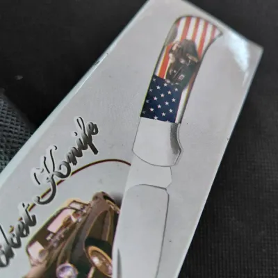 Sale Photo Thumbnail #156: Collectible USA knife.