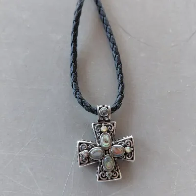 Sale Photo Thumbnail #216: Sterling Silver Cross with Abalone/Mother of Pearl on Black Braided chain.