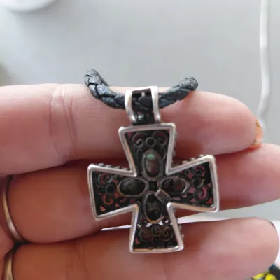 Sale Photo Thumbnail #217: Sterling Silver Cross with Abalone/Mother of Pearl on Black Braided chain.