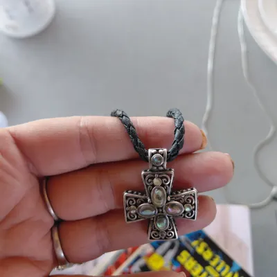 Sale Photo Thumbnail #218: Sterling Silver Cross with Abalone/Mother of Pearl on Black Braided chain.